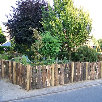 Gartenzaun aus Eiche mit verschiedenen Abschwarten Gartenzaun